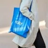 Hot Sale β€οΈ HAY Hay Blue Tote Bag Red Logo π€© 2 HAY Hay Blue Tote Bag Red Logo